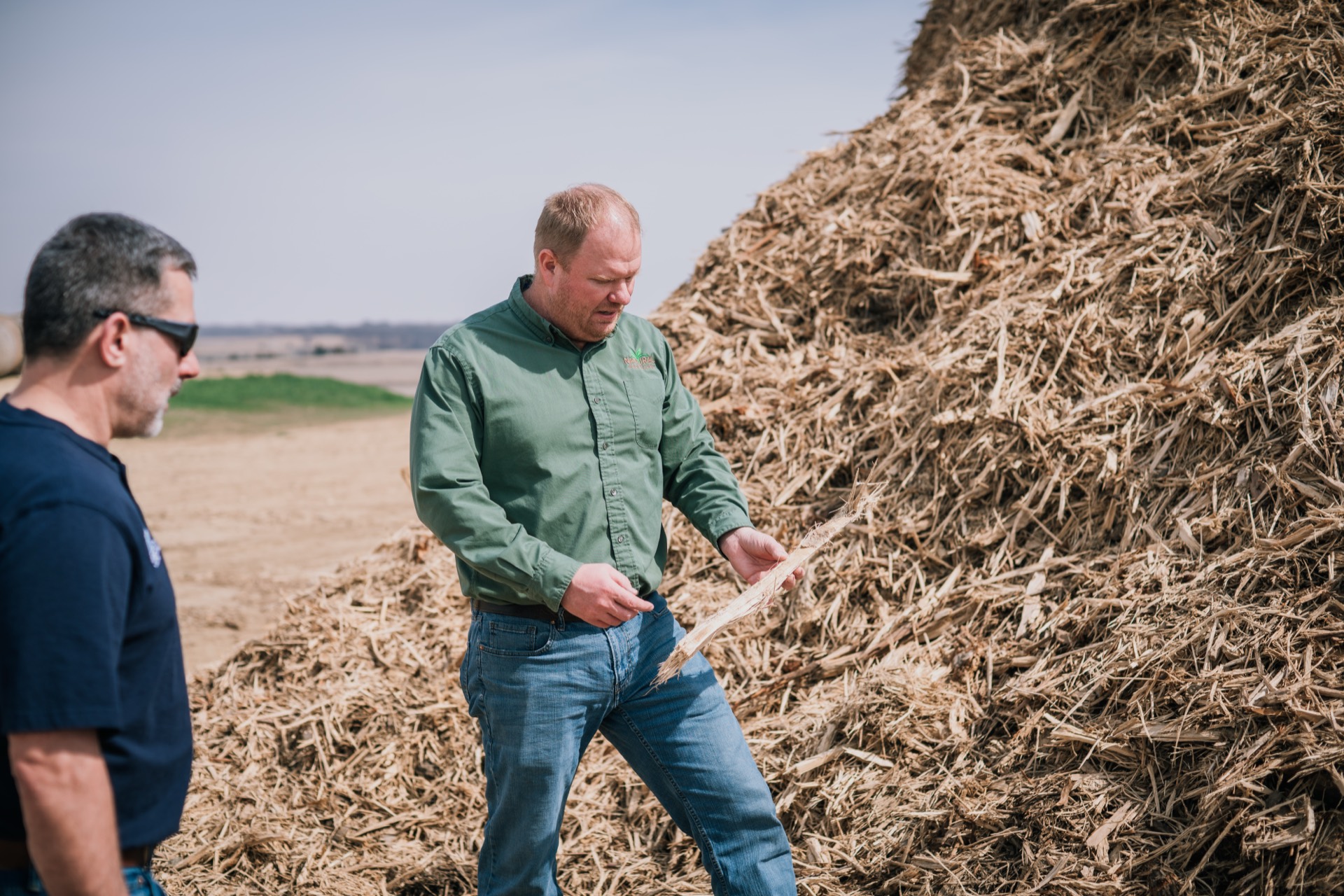 Inspecting organic feedstock at the WINR Center pile